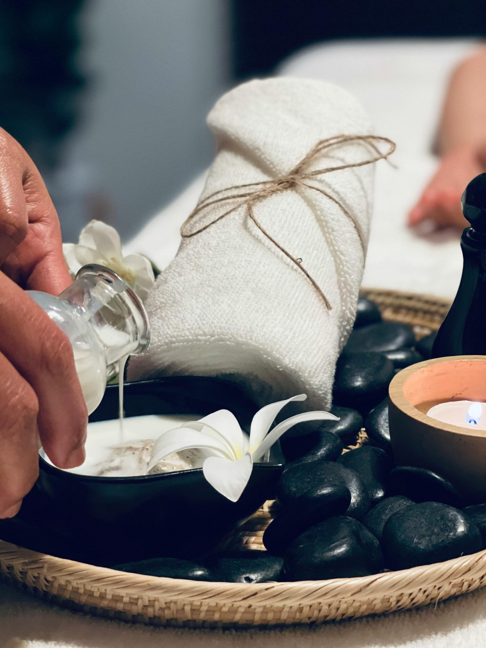 Warm chamomile latte with floral decor and diffuser on a cozy setting.